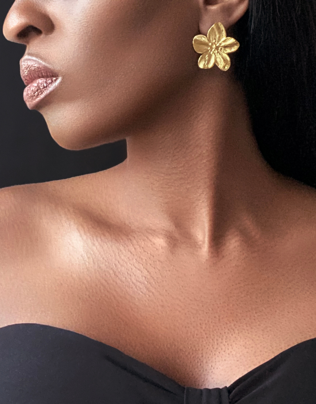 Model showcasing ABYDOS Big Flower Earrings by Jarlia By Jolina, featuring bold 18k gold-plated floral design, perfect for elevating any outfit with timeless elegance.